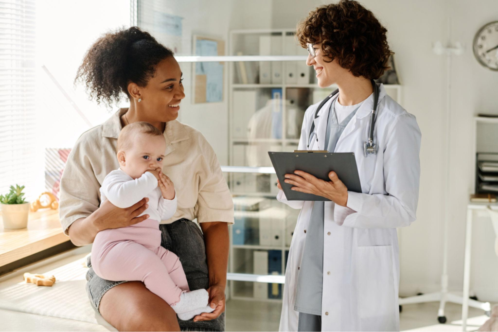 Parent consulting a doctor about RSV symptoms in a baby